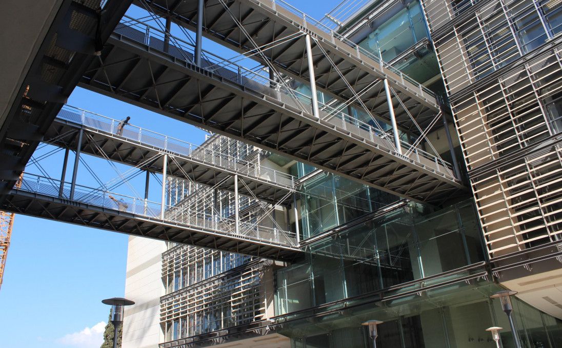Steel pedestrian bridges and stairs between buildings at the Lebanese University North Campus